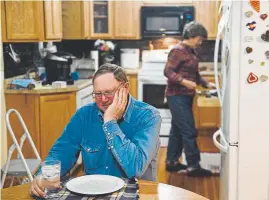  ?? Aaron Ontiveroz, The Denver Post ?? Howard Vanwinkle relaxes before dinner at nearly 9:30 p.m. on Tuesday. The Vanwinkles are in calving season — which extends their workdays to more than 16 hours.