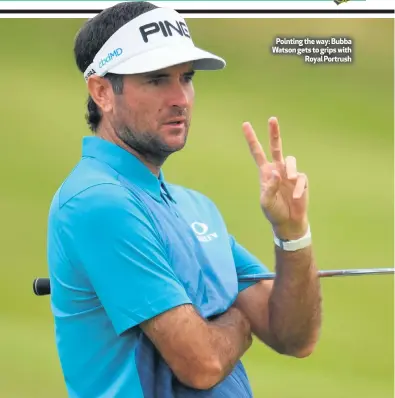  ??  ?? Pointing the way: Bubba Watson gets to grips with
Royal Portrush