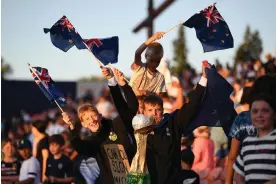  ?? Photograph: Joe Allison/Fifa/Getty Images ?? New Zealand fans show their support during the friendly against Argentina at Waikato Stadium in February 2023.