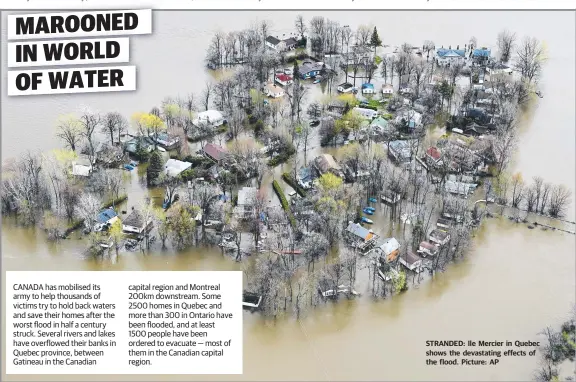  ?? STRANDED: Ile Mercier in Quebec shows the devastatin­g effects of the flood. Picture: AP ??