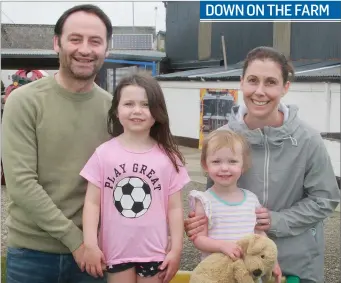  ??  ?? Ciaran and Jennifer Brady with their children, Isabelle and Sofia, at Kia Ora Mini Farm.