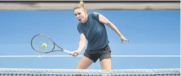  ??  ?? Simona Halep of Romania attends a practice session ahead of Australia Open in Melbourne. — AFP photo