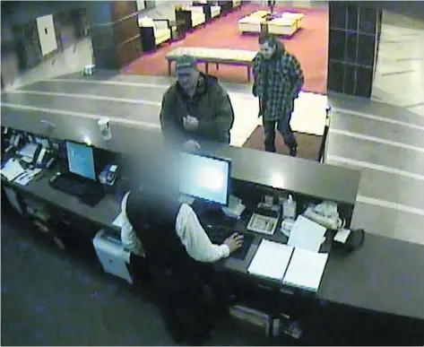  ?? REGINA POLICE SERVICE ?? Regina police released this photo in May 2016 of two men in the lobby of the Delta Hotel on Jan. 10, 2015, around the time Nadine Machiskini­c is believed to have entered the hotel and possibly rode the elevator with them. Police say they’ve exhausted...