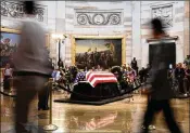  ?? OLIVIER DOULIERY / ABACA PRESS ?? Visitors pay their respects to the late U.S. Sen. John McCain as he lies in state under the dome of the U.S. Capitol Rotunda on Friday.