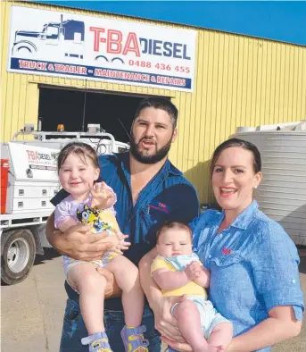  ??  ?? DRIVING FORCE: Joshua and Samara Mallardi, with Audrey, 2, and Wyatt, three months, at the new home for their business in Garbutt.