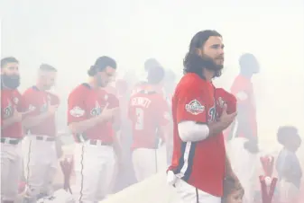  ?? Photos by Patrick Smith / Getty Images ?? Brandon Crawford of the Giants seemingly brought the San Francisco fog with him to the Home Run Derby on Monday in Washington, D.C.