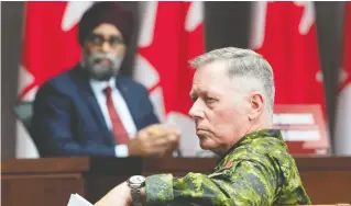  ?? ADRIAN WYLD / THE CANADIAN PRESS FILES ?? National Defence Minister Harjit Sajjan, left, is in hot water over what he knew about accusation­s toward then-chief of Defence Staff Jonathan Vance.