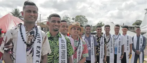  ?? Photo: Simione Haravanua ?? 2018 Vodafone Fiji Hibiscus Festival King contestant­s marched from Kinoya to the Valelevu Grounds in Nasinu before the festival’s official opening ceremony.