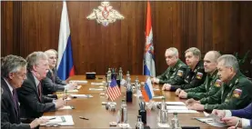  ?? VADIM SAVITSKY, RUSSIAN DEFENSE MINISTRY PRESS SERVICE VIA AP ?? U.S. National Security Adviser John Bolton, second from left, and Russian Defense Minister Sergei Shoigu, right, attend talks Tuesday in Moscow, days after President Donald Trump vowed to pull out of a key arms control treaty with Russia.