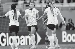  ?? SAEED KHAN/AFP TNS ?? The United States’ Sophia Smith (11) celebrates scoring her second goal against Vietnam during a World Cup group match at Eden Park in Auckland, New Zealand.