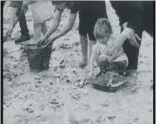  ??  ?? Cockle-picking in Castelbay in the 1930s