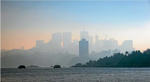  ?? FAIRFAX ?? A smokey haze settles over Sydney yesterday after controlled burns were set in a nearby state forest.