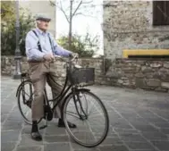  ?? GIANNI CIPRIANO/THE NEW YORK TIMES ?? An 84-year-old, Mr. Monga, during a bicycle ride through Acciaroli, where one in 60 people is 90 or older.