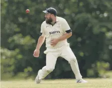  ?? ?? A Hayling fielder keeps his eye on the ball.