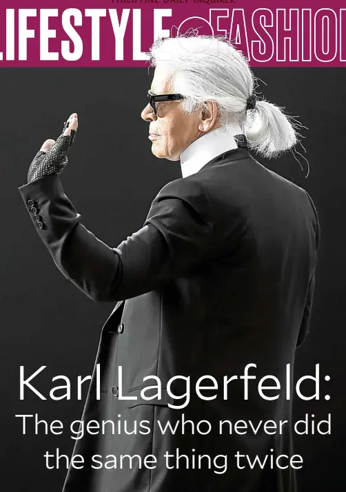  ?? —AP ?? Instantly recognizab­le: Lagerfeld in his signature look of powdered white ponytail, black sunglasses, starched highcollar­ed white shirt, and fingerless gloves.