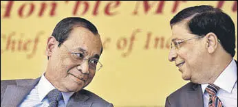  ?? ARVIND YADAV/HT ?? Chief Justice of India Dipak Misra (right) with Cjidesigna­te Justice Ranjan Gogoi.