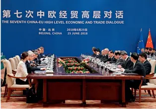 ??  ?? The Seventh China-EU High Level Economic and Trade Dialogue is co-chaired by Chinese Vice Premier Liu He and European Commission Vice President Jyrki Katainen in Beijing on June 25, 2018.