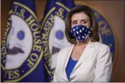  ?? MANUEL BALCE CENETA — THE ASSOCIATED PRESS ?? House Speaker Nancy Pelosi listens to questions during a news conference on Capitol Hill in Washington on Thursday.