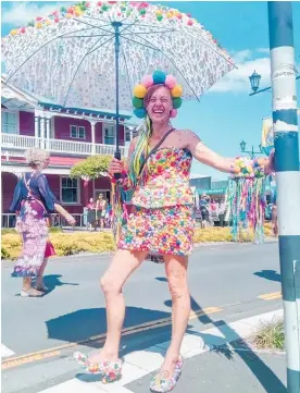  ??  ?? Dar Palmer from Waihi combined her love of fashion making with a fundraiser at the Warm Up Party. She donned her “Dotty” outfit (head to toe in pom poms) she'd made herself to raise money for Waihi Towncats.