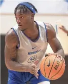  ?? CHRISTINE TANNOUS/THE COMMERCIAL APPEAL ?? The Tigers’ Damaria Franklin dribbles during an open practice on Sept. 30 at the University of Memphis.