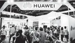  ?? FRED DUFOUR/GETTY-AFP ?? The U.S. has levied three rounds of sanctions against Chinese tech company Huawei.