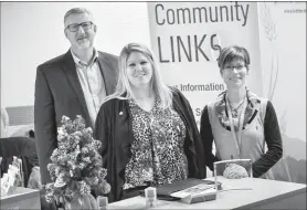  ?? Herald photo by Ian Martens ?? The City’s Marty Thomsen, library CEO Terra Plato and CMHA social worker Heather Mueller helped officially open the relocated Community Links program at the downtown branch of the Lethbridge Public Library. @IMartensHe­rald