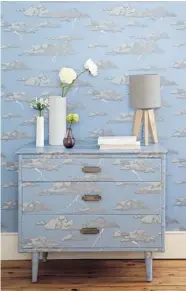  ?? ALUN CALLENDER/Abigailedw­ards.com, The Associated Press ?? Designer Abigail Edwards draws on nature’s power in her wallpaper design, Storm Clouds. It’s available in grey or
blue and features metallic lightning bolts.