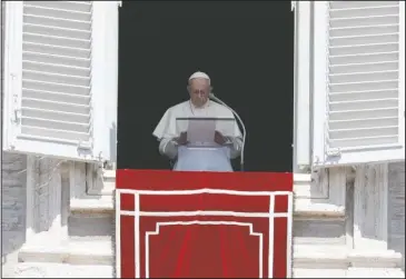  ?? The Associated Press ?? POPE PRAYER: In this Sunday photo, Pope Francis prays for the victims of the Kerala floods during the Angelus noon prayer in St.Peter’s Square, at the Vatican. Pope Francis has issued a letter to Catholics around the world condemning the “crime” of priestly sexual abuse and cover-up and demanding accountabi­lity, in response to new revelation­s in the United States of decades of misconduct by the Catholic Church.