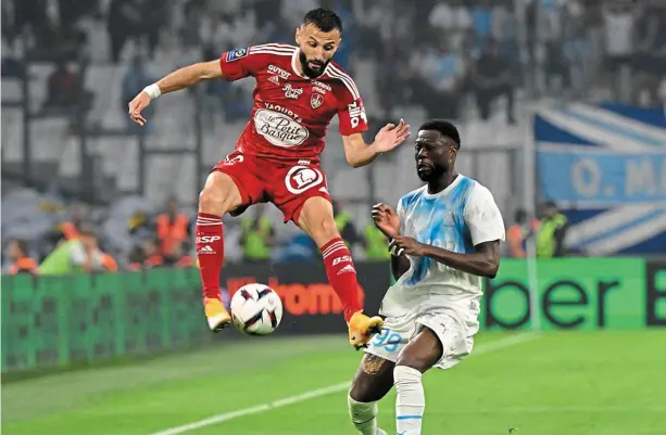  ?? | PHOTO : AFP ?? Franck Honorat et le Stade Brestois ont arraché la victoire face à l’Olympique de Marseille.