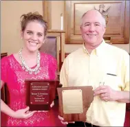  ?? MAYLON RICE SPECIAL TO ENTERPRISE-LEADER ?? Bethany Henry Rosenbaum and John McLarty show off their appreciati­on plaques following their presentati­on on historic trails of Arkansas and Washington County at the Statehood Day ceremony, held June 10 at First Christian Church in Fayettevil­le. Arkansas’ official statehood became law on June 15, 1836.