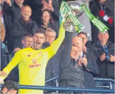  ??  ?? Fraser Forster and Neil Lennon with the Betfred Cup.