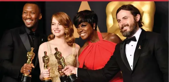  ?? FRAZER HARRISON/GETTY IMAGES FILE PHOTO ?? This year’s Oscar acting winners, Mahershala Ali, Emma Stone, Viola Davis and Casey Affleck. Expect to see more diversity when nomination­s for 2018 are announced, writes Peter Howell.