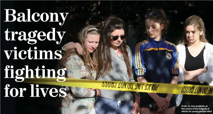  ??  ?? Irish J1 visa students at the scene of the tragedy in which six young people died.