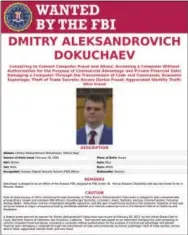  ?? FBI VIA AP ?? This wanted poster provided by the FBI shows Dmitry Aleksandro­vich Dokuchaev, 33, a Russian national and resident. The United States announced charges Wednesday, March 15, against two Russian intelligen­ce officers, including Dokuchaev, and two hackers,...