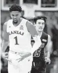  ?? CHARLIE RIEDEL/ASSOCIATED PRESS ?? Kansas’ Dedric Lawson celebrates after making a 3-pointer against New Mexico State on Saturday.