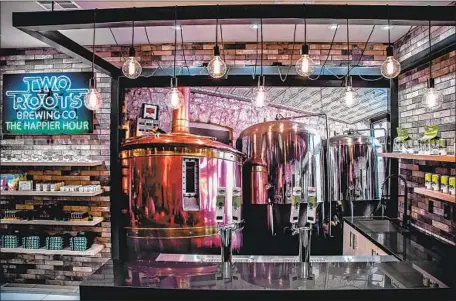  ?? Cannabinie­rs / Two Roots Brewing Co. ?? TWO ROOTS Brewing Co., owned by San Diego firm Cannabinie­rs, sells a cannabis-infused beer at ReLeaf Dispensary in Las Vegas.