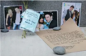  ?? DARRYL DYCK/ THE CANADIAN PRESS ?? A memorial is set up for Canadian actor Cory Monteith outside the Fairmont Pacific Rim Hotel in Vancouver. Monteith’s body was found in a room at the hotel last Saturday.