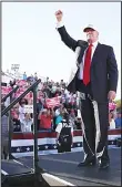  ??  ?? US Republican presidenti­al candidate Donald Trump pumps his fist in the air during a campaign rally at the Collier County Fairground­s on Oct 23 in Naples, Florida. Early voting in Florida in the presidenti­al election begins Oct
24.