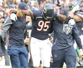  ??  ?? Bears defensive end Roy Robertson- Harris injured his hamstring Oct. 22 against the Carolina Panthers but practiced in full Thursday.
| NAM Y. HUH/ AP