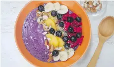  ??  ?? Healthy and delicious smoothie bowls let you play around with different combinatio­ns of greens and berries. The options are endless.