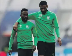  ?? Reuters ?? Saudi Arabia’s Fahad Al Muwallad, left, and Muhannad Assiri during training at the Volgograd Arena yesterday