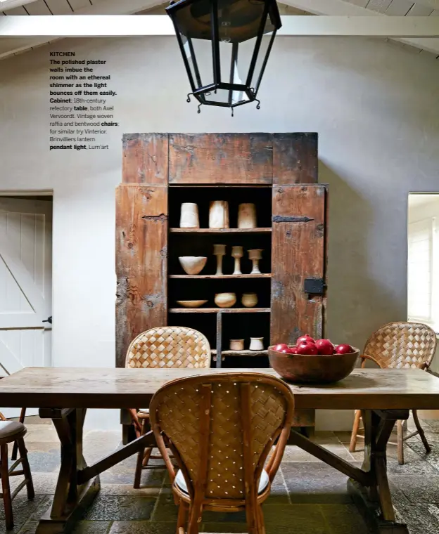  ??  ?? KITCHEN
The polished plaster walls imbue the room with an ethereal shimmer as the light bounces off them easily. Cabinet; 18th-century
refectory table, both Axel Vervoordt. Vintage woven raffia and bentwood chairs; for similar try Vinterior. Brinvillie­rs lantern pendant light, Lum’art