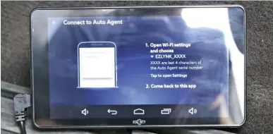  ??  ??  The EZ Lynk system will use an Auto Agent app that can be downloaded onto any smart device like your phone or tablet. This allows you to connect to the Wi-fi capable box to download your new tunes into the vehicle’s ECM and TCM. While a smartphone can do it, we opted to install the newly released monitor from GDP Tuning as well. The system is easy to use and will walk you through tuning the engine and transmissi­on. The Shift-on-the-fly tune package gives us five tunes, in varying horsepower levels, that we can select while driving with a simple twist of the knob installed next to the OBD-II port.