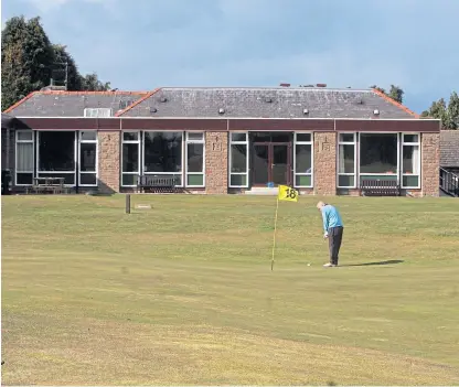  ??  ?? A golfer putts at the 18th green of the Forfar course, which was originally designed by Tom Morris.