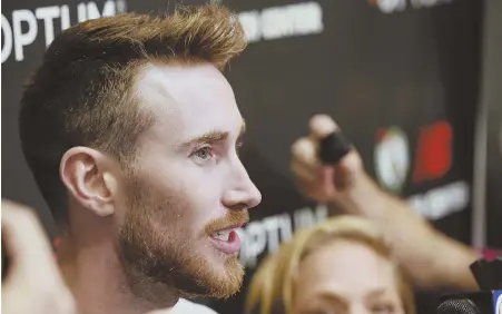  ?? STAFF PHOTO BY NICOLAUS CZARNECKI ?? ONE STEP AT A TIME: Celtics forward Gordon Hayward, who scored 10 points in Friday’s 104-97 preseason loss to the Charlotte Hornets, speaks to the media earlier this month at the Auerbach Center.