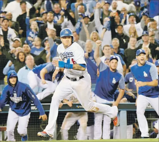  ?? Wally Skalij Los Angeles Times ?? MANNY MACHADO races home with the winning run in Game 4. “I think I got an advantage to help my team in any way I can to win the games here,” he says.