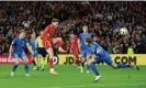  ?? CameraSpor­t/Getty Images ?? David Brooks opens the scoring for Wales against Finland. Photograph: Ian Cook/