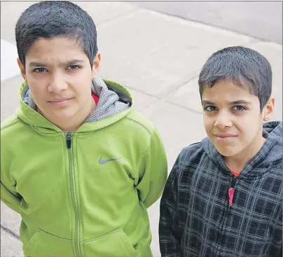  ?? JIM DAY/THE GUARDIAN ?? Ziyad Salman, left, and his brother, Omar, are pleading for the public’s help to bring their father to P.E.I.