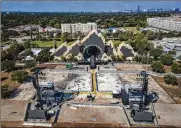  ?? MARK MULLIGAN / HOUSTON CHRONICLE VIA AP ?? The Astroworld main stage where Travis Scott performed Friday and where a surging crowd killed eight people, sits full of debris from the concert, in a parking lot at NRG Center in Houston.