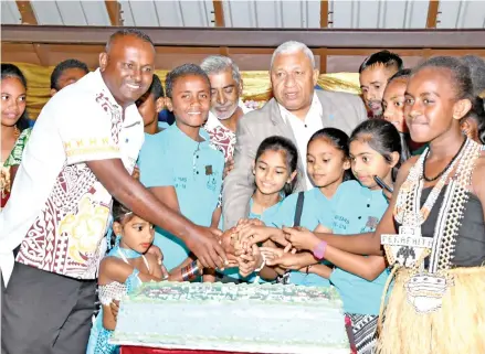  ?? Photo: DEPTFO News ?? Prime Minister Voreqe Bainimaram­a with Sabeto Central School students and guests during the school centennial anniversar­y on August 9, 2018.